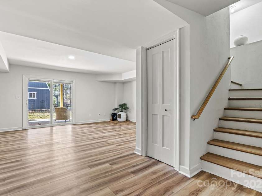3995 Burton Lane, Denver, NC 28037.  MLS# CAR4219369, YatesRealty ID 11586. Need extra space? This finished walk-out basement is perfect as a place to gather, to use as a gameroom or to use as added sleeping areas for guests