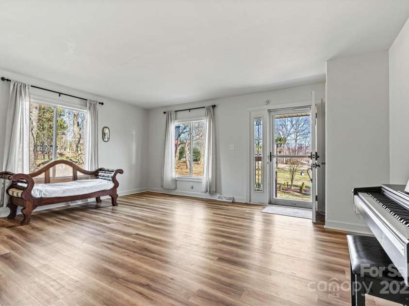 3995 Burton Lane, Denver, NC 28037.  MLS# CAR4219369, YatesRealty ID 11586. Plenty of Natural Light, this room is perfect for gatherings