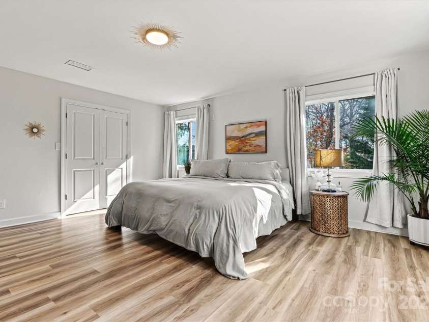 3995 Burton Lane, Denver, NC 28037.  MLS# CAR4219369, YatesRealty ID 11586. Primary bedroom has lots of natural light. Plenty of room for multiple beds if you were to use this property as a rental
