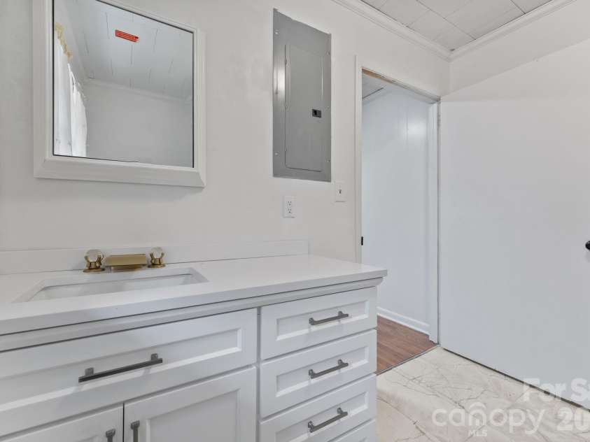 217 Lambert Road, Biscoe, NC 27209.  MLS# CAR4357654, YatesRealty ID 11588. Full bath #3 (near carport)