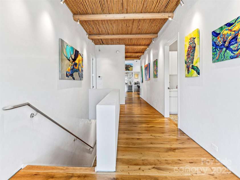 75 Broadway Street, Asheville, NC 28801.  MLS# CAR4219180, YatesRealty ID 11589. Art walls throughout this luxury home
