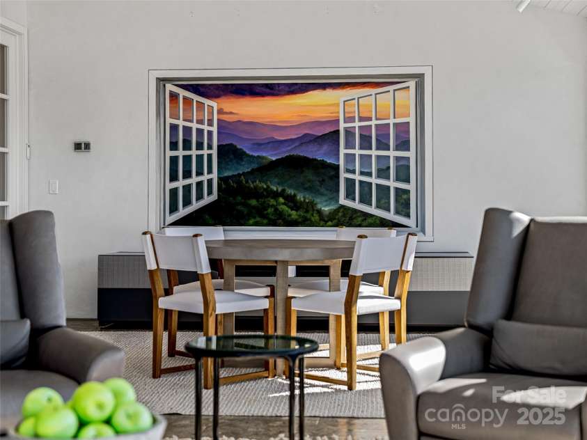 75 Broadway Street, Asheville, NC 28801.  MLS# CAR4219180, YatesRealty ID 11589. Artistic touches that convert into an entertainment wall