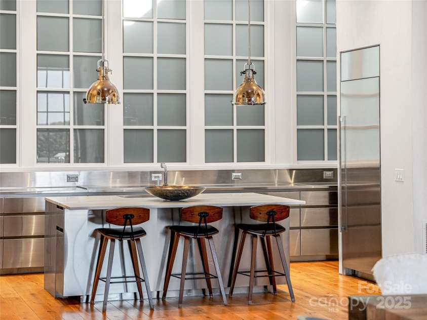 75 Broadway Street, Asheville, NC 28801.  MLS# CAR4219180, YatesRealty ID 11589. Wall of windows in this gourmet kitchen