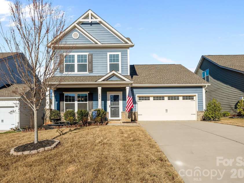 204 Old Harbor Drive, Mount Gilead, NC 27306.  MLS# CAR4335591, YatesRealty ID 1159. Front View