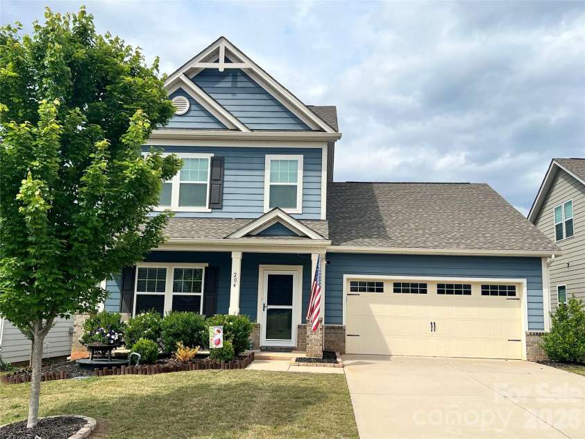 204 Old Harbor Drive, Mount Gilead, NC 27306.  MLS# CAR4335591, YatesRealty ID 1159. Front View