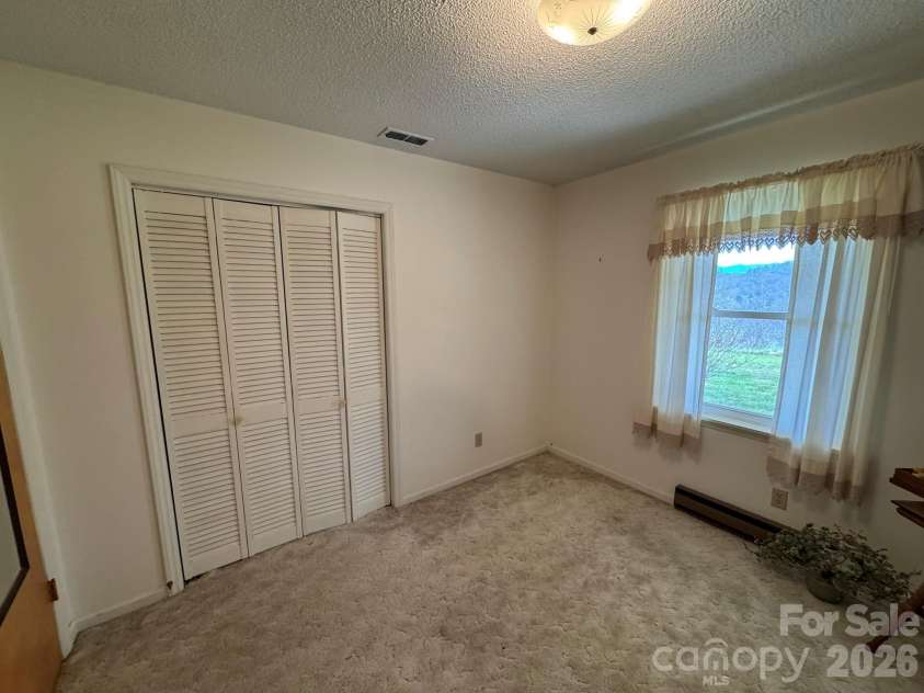 470 Ela Lane, Bryson City, NC 28713.  MLS# CAR4358467, YatesRealty ID 11591. 