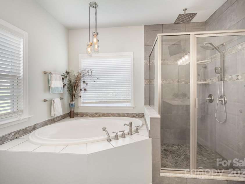 5172 Norway Road, Rock Hill, SC 29732.  MLS# CAR4242482, YatesRealty ID 11591. Extra deep soaking tub and tile shower