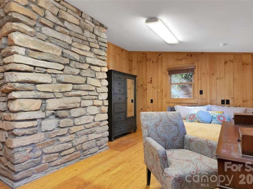 231 Cedar Lane, Brevard, NC 28712.  MLS# CAR4358033, YatesRealty ID 11596. Bonus room off of main room
