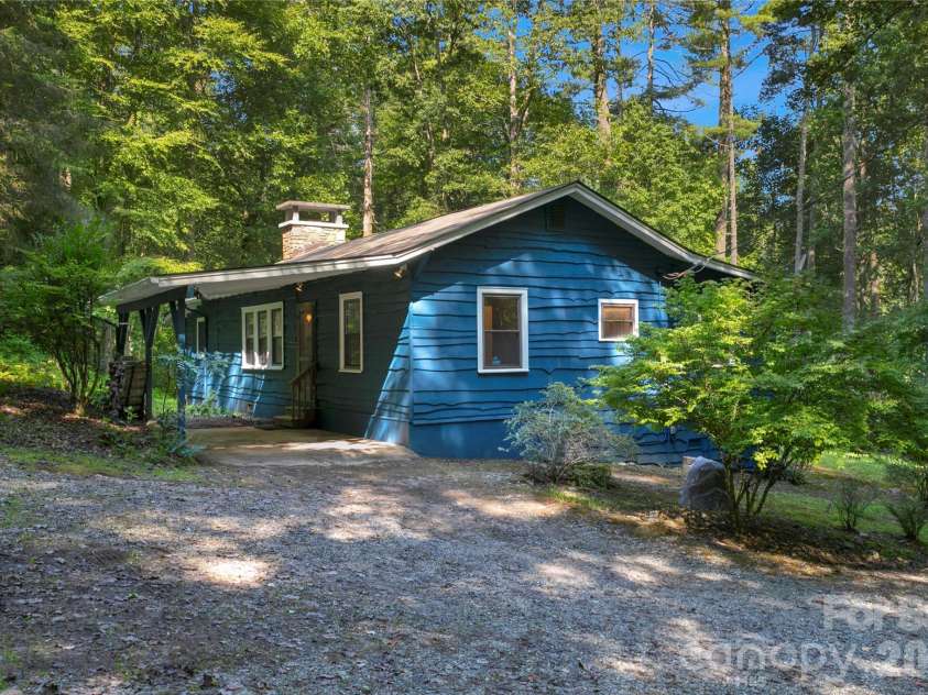 231 Cedar Lane, Brevard, NC 28712.  MLS# CAR4358033, YatesRealty ID 11596. Car port entrance