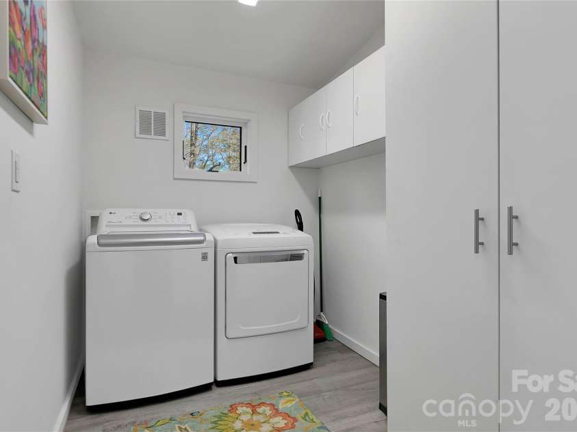 231 Cedar Lane, Brevard, NC 28712.  MLS# CAR4358033, YatesRealty ID 11596. Laundry room and Pantry