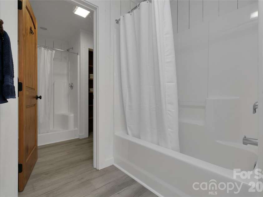 231 Cedar Lane, Brevard, NC 28712.  MLS# CAR4358033, YatesRealty ID 11596. Primary bath