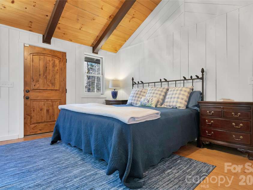 231 Cedar Lane, Brevard, NC 28712.  MLS# CAR4358033, YatesRealty ID 11596. Primary bedroom
