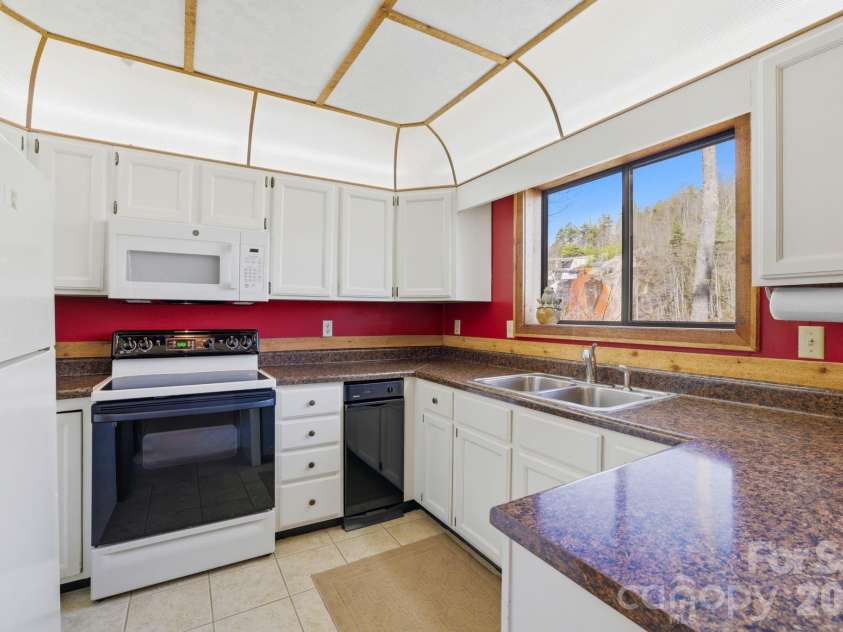 221 Toxaway Falls Drive, Lake Toxaway, NC 28747.  MLS# CAR4357279, YatesRealty ID 11598. 
