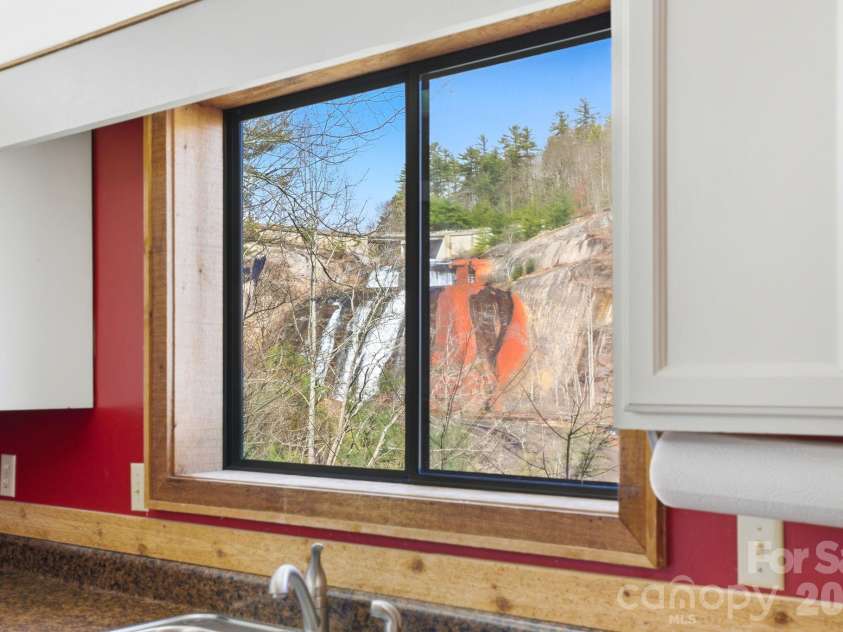 221 Toxaway Falls Drive, Lake Toxaway, NC 28747.  MLS# CAR4357279, YatesRealty ID 11598. 