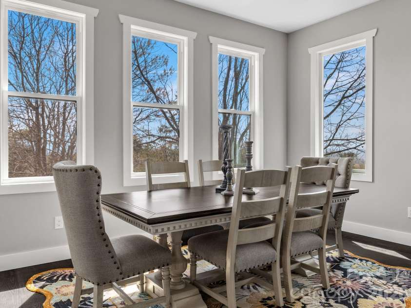 345 Preservation Trail, Columbus, NC 28722.  MLS# CAR4357487, YatesRealty ID 11600. Dining area with large windows.
