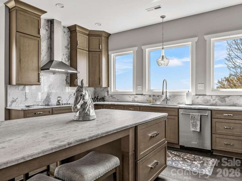 345 Preservation Trail, Columbus, NC 28722.  MLS# CAR4357487, YatesRealty ID 11600. Expansive island for cooking and casual dining.