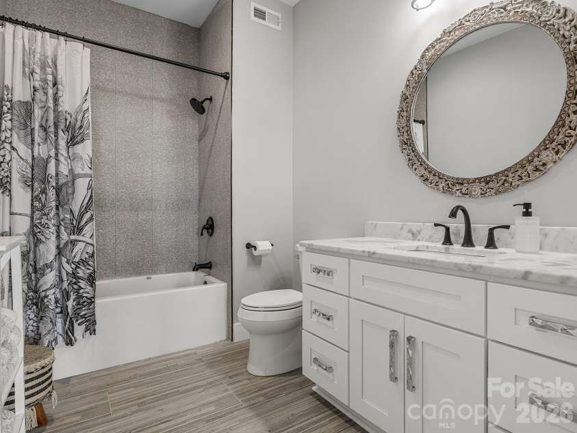 345 Preservation Trail, Columbus, NC 28722.  MLS# CAR4357487, YatesRealty ID 11600. Lower level bath #1