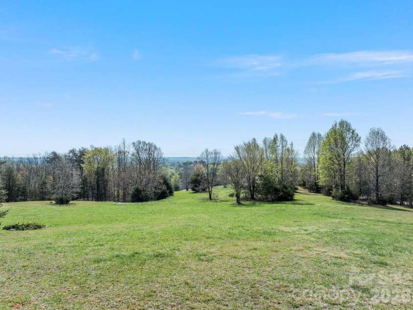 345 Preservation Trail, Columbus, NC 28722.  MLS# CAR4357487, YatesRealty ID 11600. Lush, established pasture