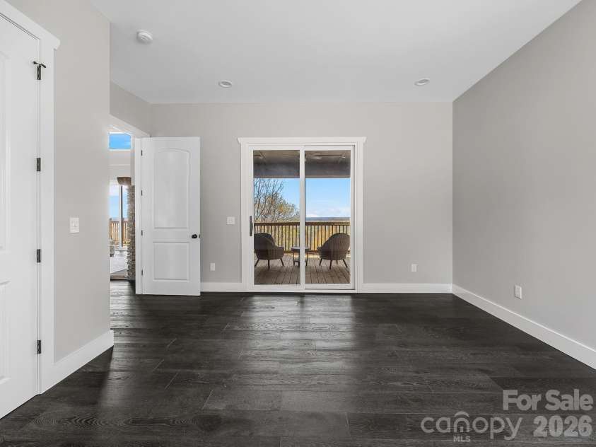 345 Preservation Trail, Columbus, NC 28722.  MLS# CAR4357487, YatesRealty ID 11600. Main floor office space with closet and  exit to outside deck. 