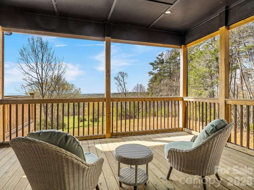 345 Preservation Trail, Columbus, NC 28722.  MLS# CAR4357487, YatesRealty ID 11600. Main floor outside deck. 