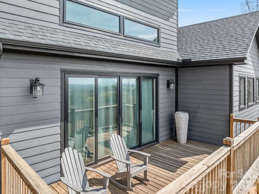 345 Preservation Trail, Columbus, NC 28722.  MLS# CAR4357487, YatesRealty ID 11600. Main level deck off living room.