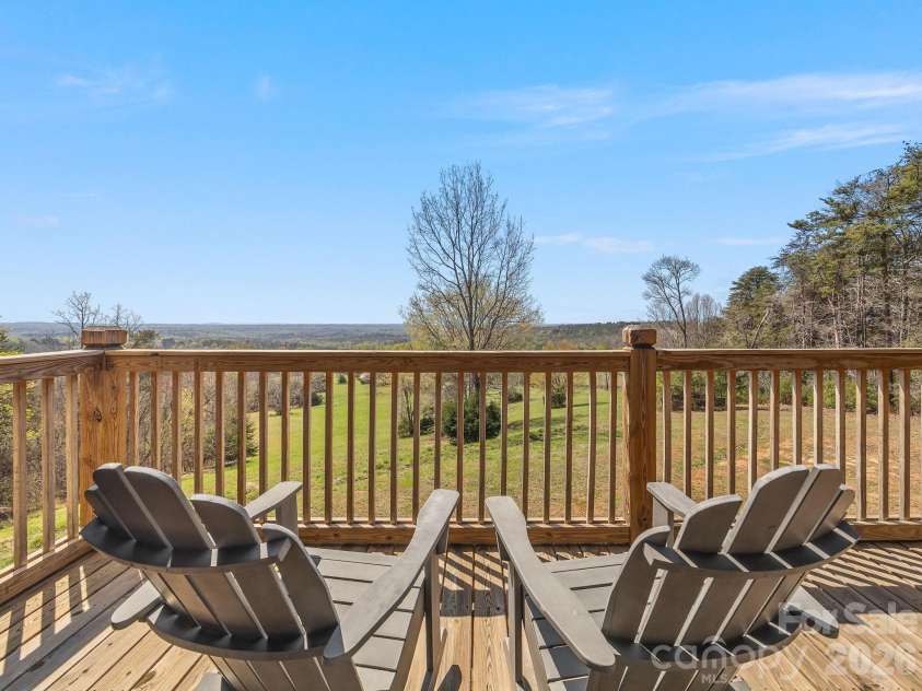 345 Preservation Trail, Columbus, NC 28722.  MLS# CAR4357487, YatesRealty ID 11600. Main level deck with piedmont views