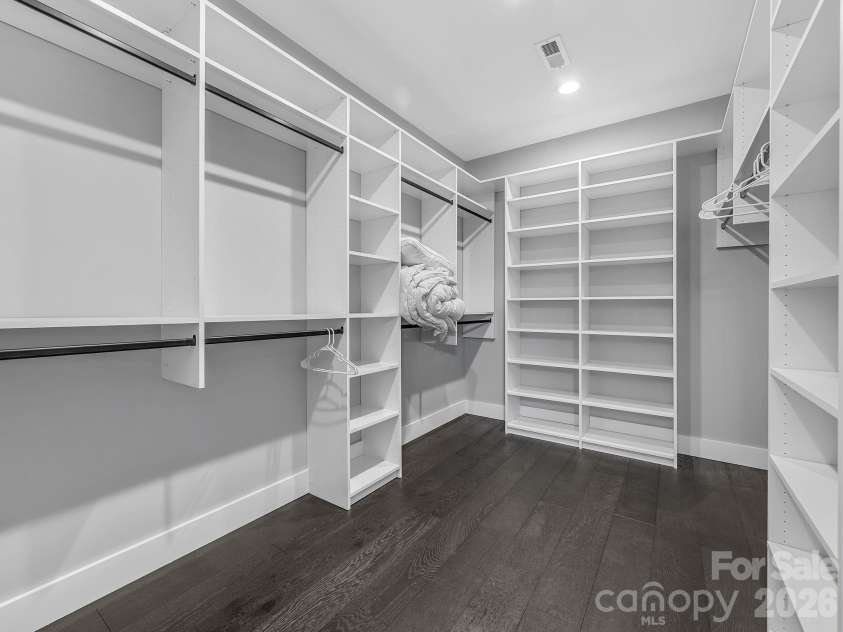 345 Preservation Trail, Columbus, NC 28722.  MLS# CAR4357487, YatesRealty ID 11600. Primary custom closet.