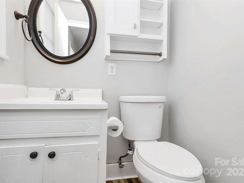 6517 Paleface Place, Charlotte, NC 28214.  MLS# CAR4255307, YatesRealty ID 11607. 1/2 bath in master bedroom