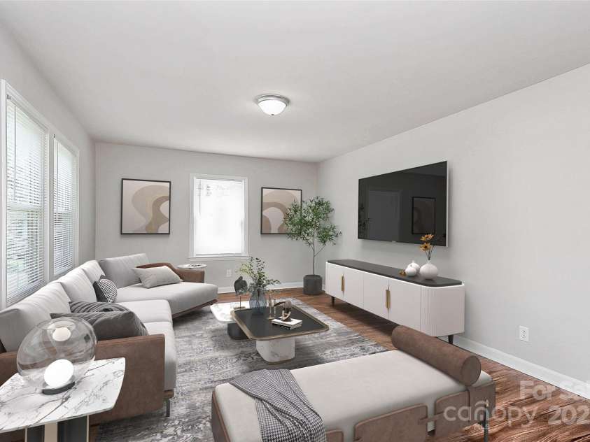 6517 Paleface Place, Charlotte, NC 28214.  MLS# CAR4255307, YatesRealty ID 11607. Virtual staged living room