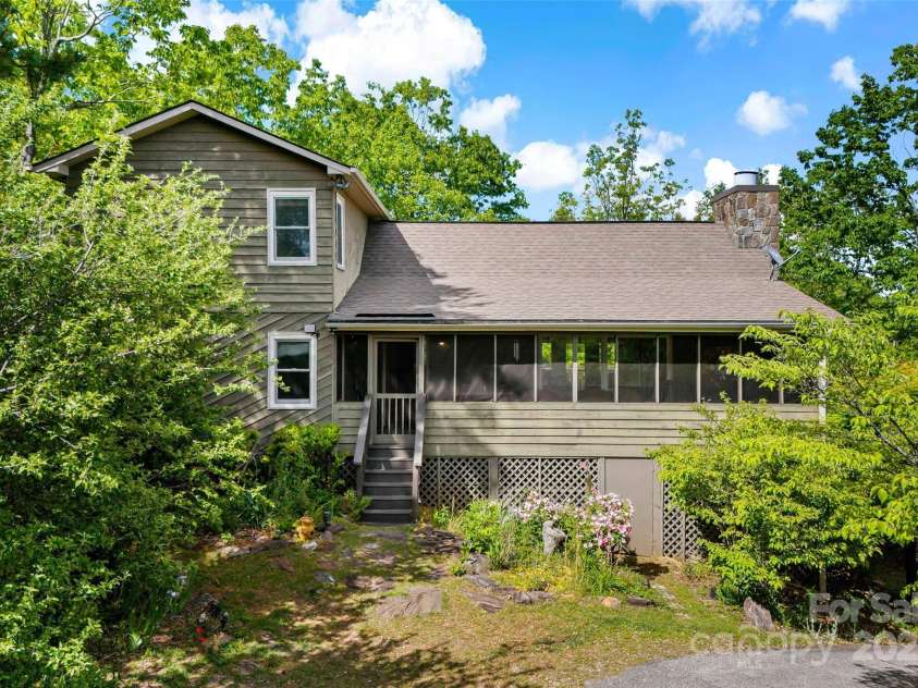 1795 Mckenzie Way, Old Fort, NC 28762.  MLS# CAR4256419, YatesRealty ID 11609. Side view near parking area