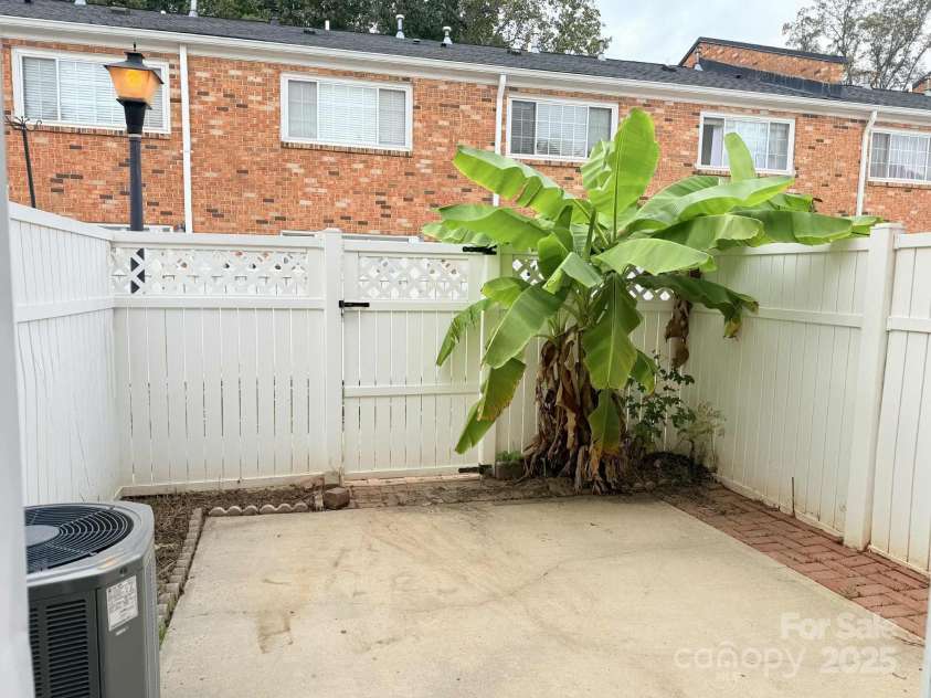 1218 Green Oaks Lane, Charlotte, NC 28205.  MLS# CAR4311508, YatesRealty ID 1161. Back Patio
