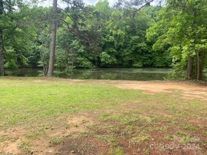 2484 Shelton Avenue, Statesville, NC 28677.  MLS# CAR4201064, YatesRealty ID 1161. Yard & Pond