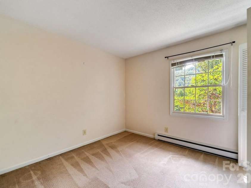 1168 North Country Club Drive, Cullowhee, NC 28723.  MLS# CAR4359441, YatesRealty ID 11610. 