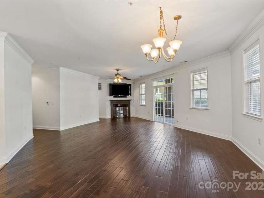 9047 Rosalyn Glen Road, Cornelius, NC 28031.  MLS# CAR4254463, YatesRealty ID 11612. LOOKING IN TO LIVING ROOM FROM DINING AREA