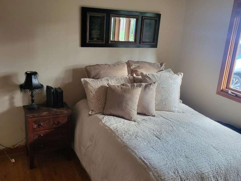 377 Riverwood Road, Mooresville, NC 28117.  MLS# CAR4192992, YatesRealty ID 11616. 2nd main floor bedroom w/walk-in closet and ceiling fan.