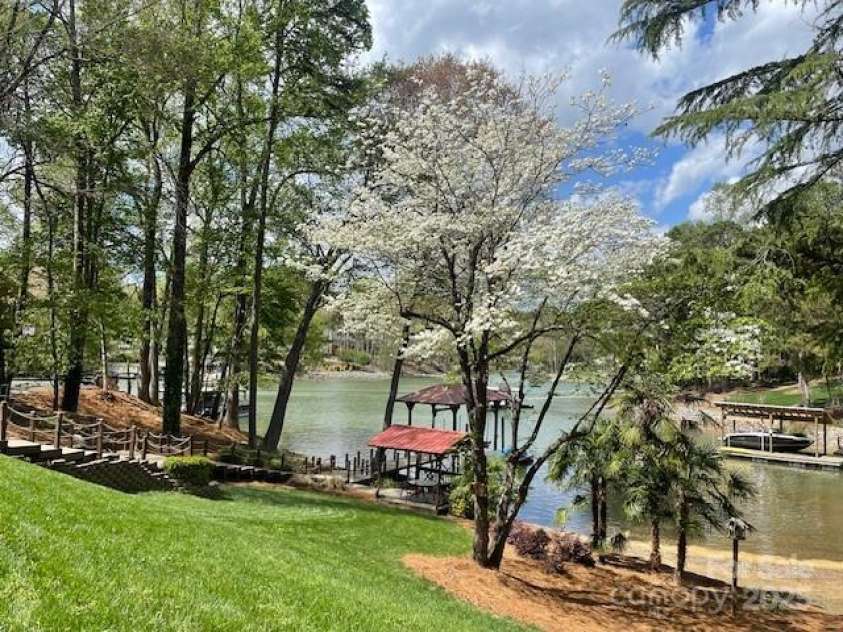 377 Riverwood Road, Mooresville, NC 28117.  MLS# CAR4192992, YatesRealty ID 11616. Amazing waterfront home in McCrary Creek on Lake Norman close to shopping, restaurants, and award-winning schools. 175 feet of shoreline...