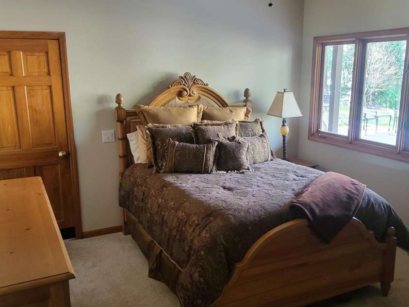377 Riverwood Road, Mooresville, NC 28117.  MLS# CAR4192992, YatesRealty ID 11616. Basement bedroom with views of lake and big walk-in closet and attached bathroom! Can be used as a 2nd primary if needed!