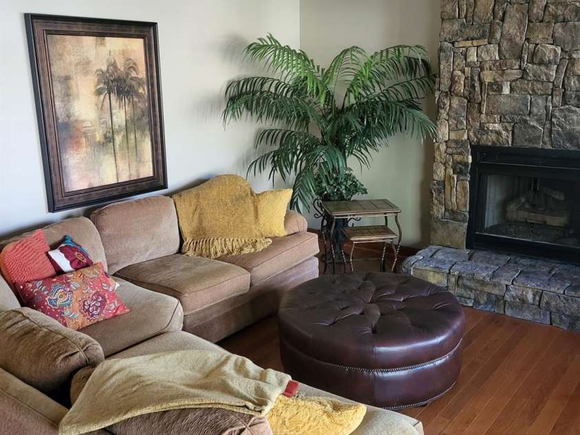 377 Riverwood Road, Mooresville, NC 28117.  MLS# CAR4192992, YatesRealty ID 11616. Imagine curling up in your cozy basement family room after a relaxing spa time in hot tub or swim in the lake!