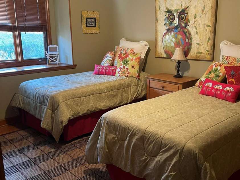 377 Riverwood Road, Mooresville, NC 28117.  MLS# CAR4192992, YatesRealty ID 11616. Main floor bedroom w/walk-in closet and ceiling fan.
