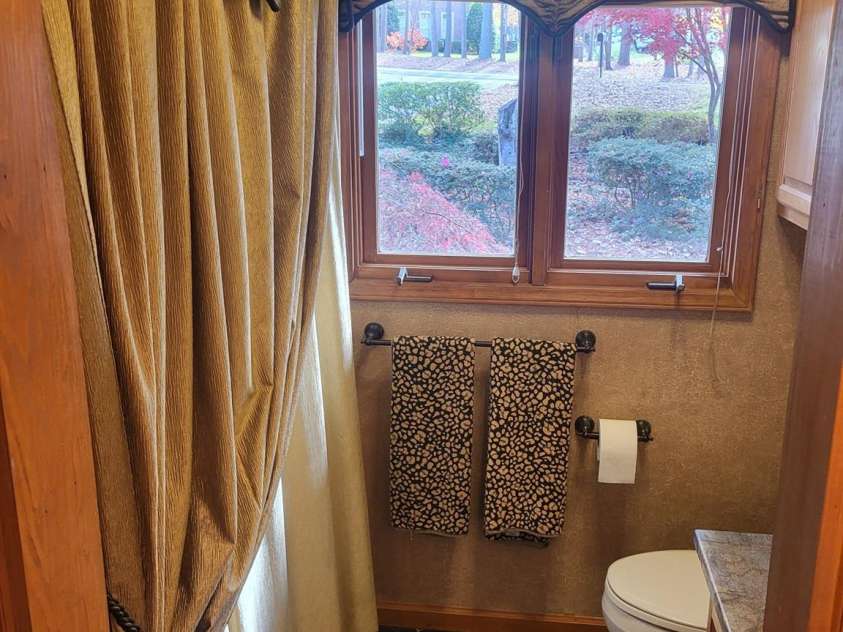 377 Riverwood Road, Mooresville, NC 28117.  MLS# CAR4192992, YatesRealty ID 11616. Main floor shower/tub combo.