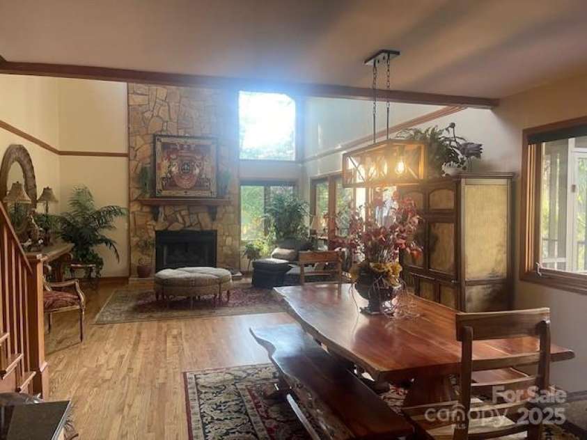 377 Riverwood Road, Mooresville, NC 28117.  MLS# CAR4192992, YatesRealty ID 11616. New light fixture over dining for your lakeside gourmet meals.