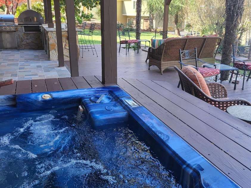 377 Riverwood Road, Mooresville, NC 28117.  MLS# CAR4192992, YatesRealty ID 11616. Relax, unwind, and enjoy your views from your hot tub.