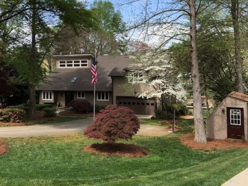 377 Riverwood Road, Mooresville, NC 28117.  MLS# CAR4192992, YatesRealty ID 11616. Unique waterfront home has 6 bedrooms on 3 levels and is great for families or for rental opportunities.