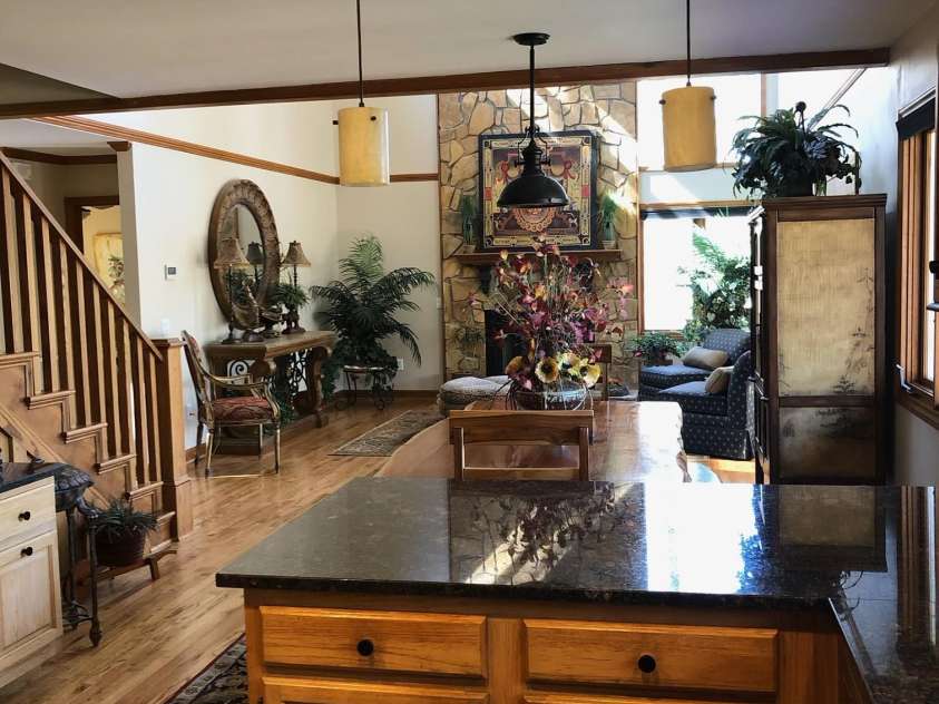 377 Riverwood Road, Mooresville, NC 28117.  MLS# CAR4192992, YatesRealty ID 11616. View from kitchen into dining/great room