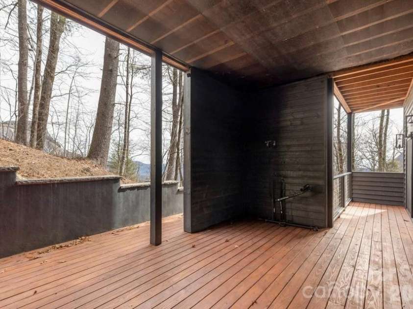 692 Lost Trail, Highlands, NC 28741.  MLS# CAR4360852, YatesRealty ID 11617. Cover Deck on Lower Level