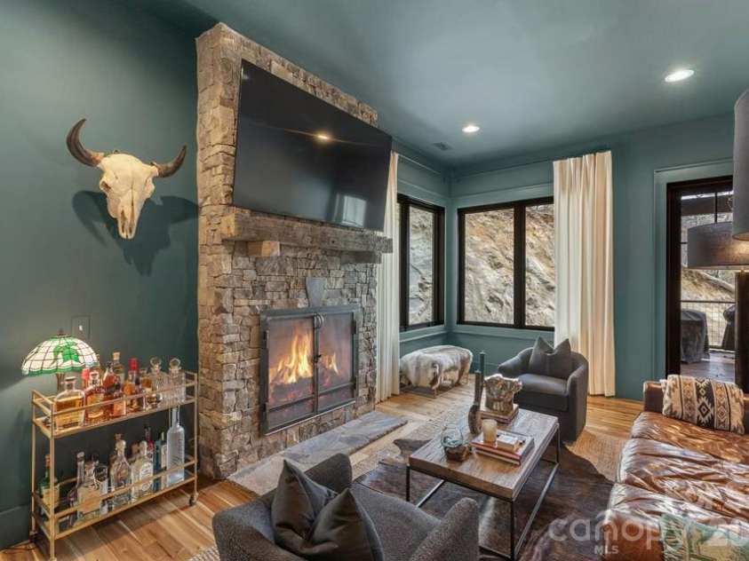 692 Lost Trail, Highlands, NC 28741.  MLS# CAR4360852, YatesRealty ID 11617. Den with Fireplace on Main Level