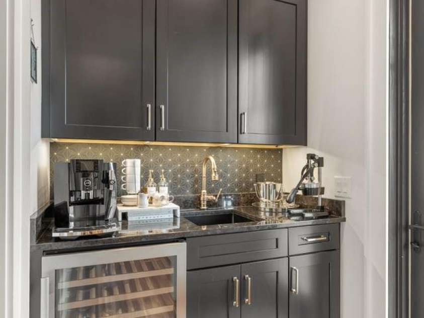 692 Lost Trail, Highlands, NC 28741.  MLS# CAR4360852, YatesRealty ID 11617. Wet Bar off Kitchen