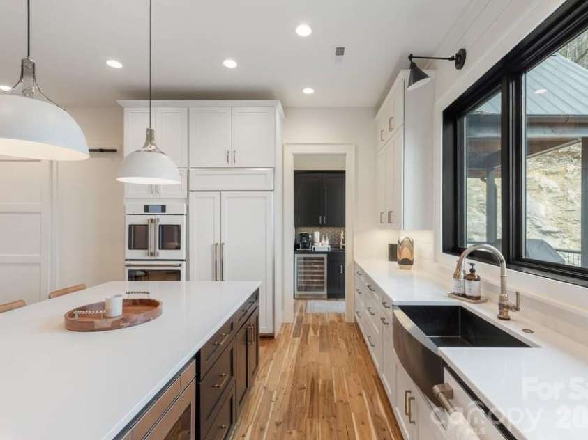 692 Lost Trail, Highlands, NC 28741.  MLS# CAR4360852, YatesRealty ID 11617. Wet Bar off Kitchen with Wine Fridge