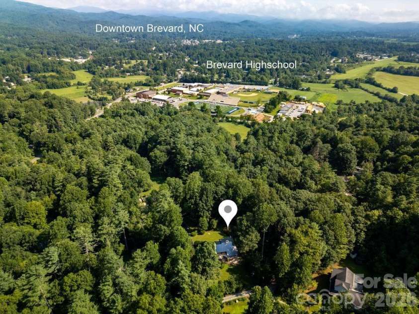 100 Ashton Lane, Brevard, NC 28712.  MLS# CAR4411812, YatesRealty ID 11621. A Short Stroll From Town