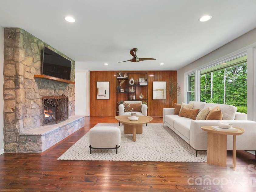 100 Ashton Lane, Brevard, NC 28712.  MLS# CAR4411812, YatesRealty ID 11621. Cozy Living Room